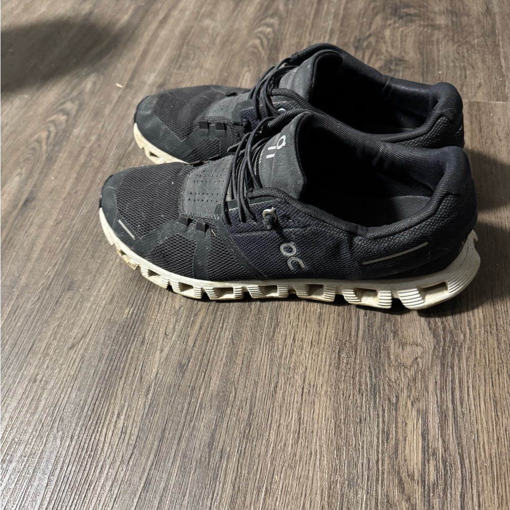 On Running Women’s Black Athletic Sneakers with White Sole